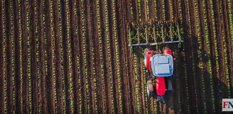 tractor ploughing field