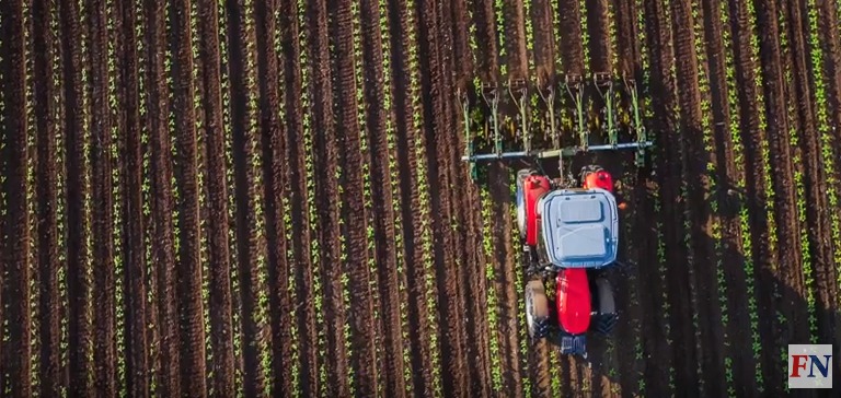 tractor ploughing field