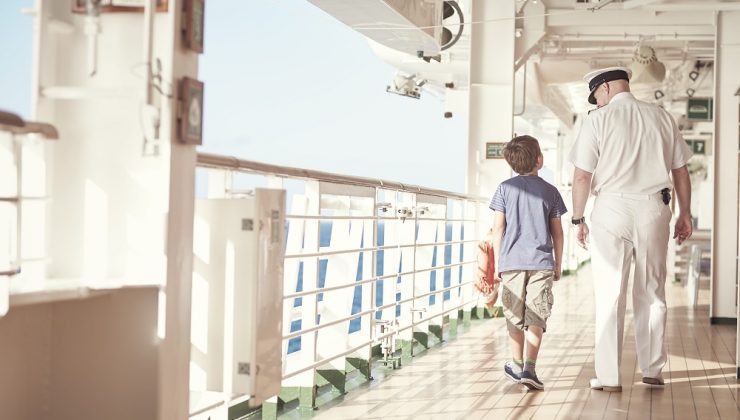 boy and captain on cruise ship