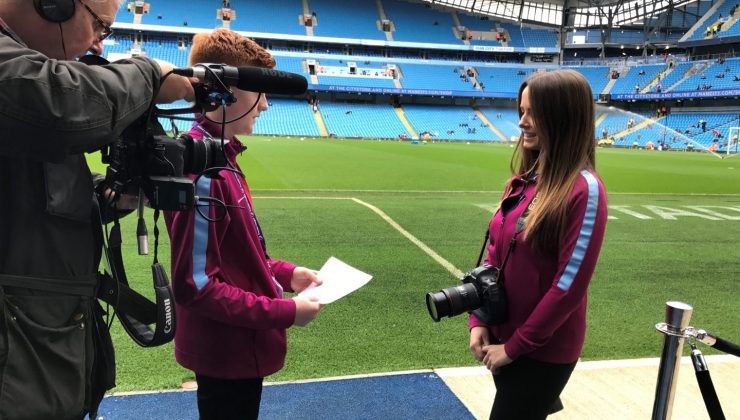 photographer interview at football stadium