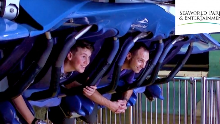 people riding rollercoaster